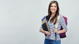 Fototapeta  - Student woman with backpack holding book and notebooks.