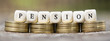 Web banner of pension savings plan concept - money coins with letters