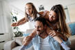 © NDABCREATIVITY - Happy family having fun time at home