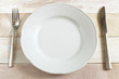 © riyat - Diet  Concept  White Dish,knife and fork on wood table