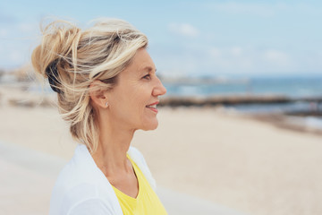 Wall Mural - Attractive serious blond woman profile portrait