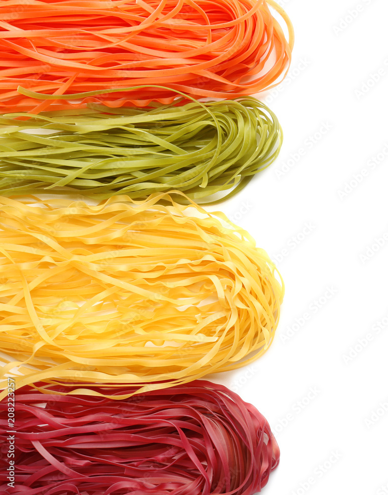 Color raw pasta on white background