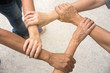 © montira - Hand hold togethet in team for success something or take care.
