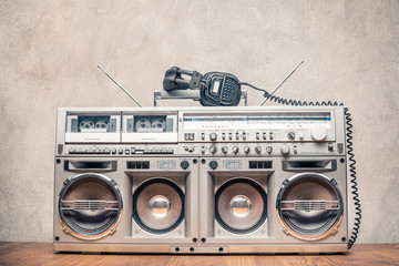 Wall Mural - retro old ghetto blaster stereo radio cassette tape recorder boombox from circa 1980s and headphones