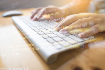 Wall Mural - programmer hands working at home with computer. woman writing a code. female programmer hands on the