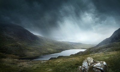 Wall Mural - a place of myths and legends. wild weather and terrain make for good adventures. mountains and lakes