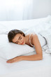 © puhhha - White Bedding. Woman Sleeping On Mattress With Pillow.
