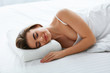 © puhhha - Healthy Sleep. Woman Sleeping On White Orthopedic Pillow