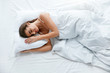 Healthy Sleep. Woman Sleeping On White Bedding