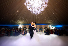 Happy Bride And Groom And Their First Dance, Wedding In The Elegant Restaurant