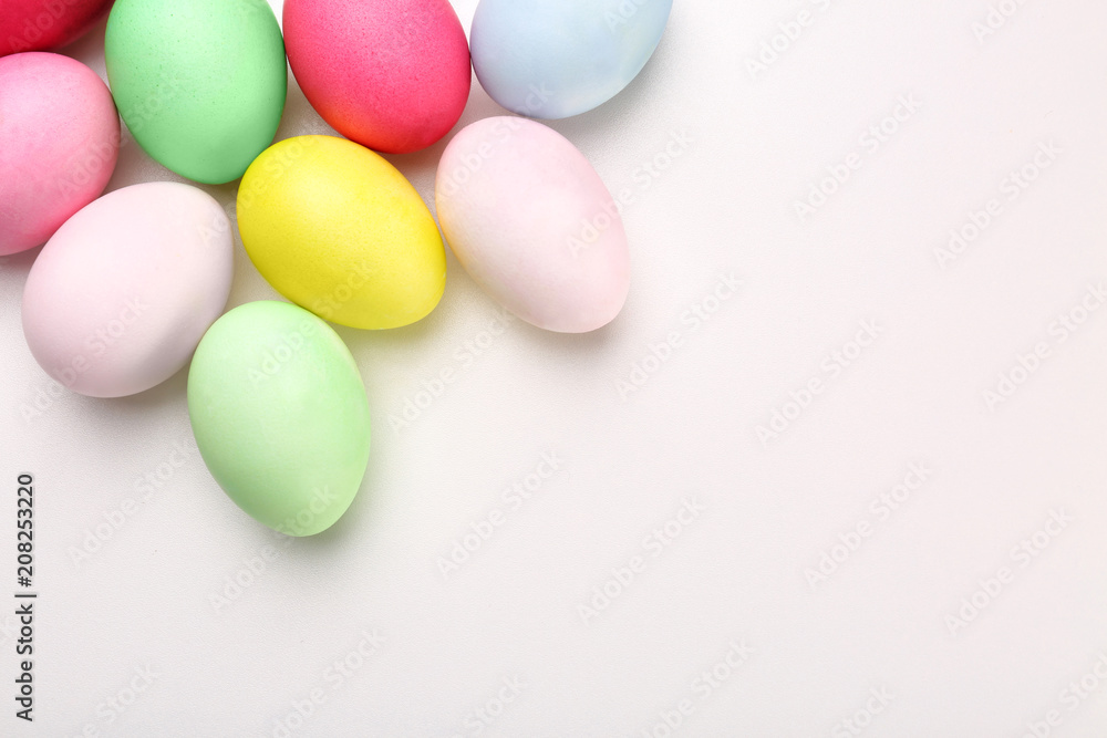 Dyed Easter eggs on white background