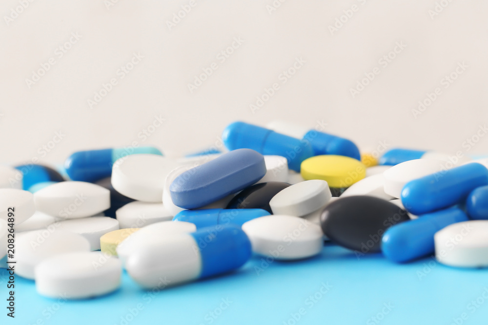 Different pills on table
