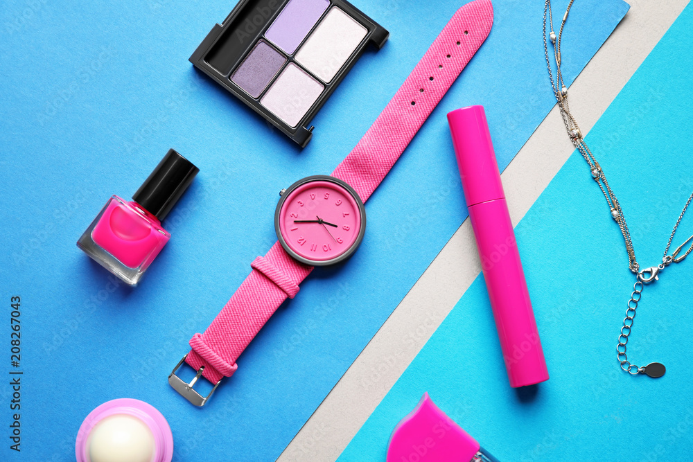 Set of decorative cosmetics and accessories on color background, flat lay