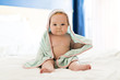 © Louis-Photo - beautiful baby girl in the bed at home with