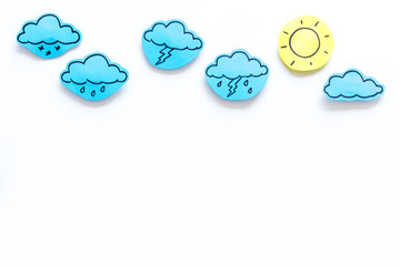 Wall Mural - modern weather icons set on white background top view copy space