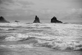 Fototapeta Big Ben - A monochrome rendition of wild Pacific waves and sea stacks, Short Beach, Tillamook County, Oregon.