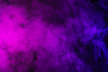 abstract pink and purple smoke on black background