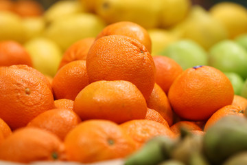 Fresh oranges on the supermarket counter