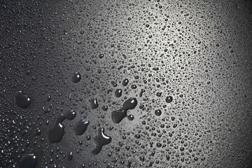 Canvas Print - water drops on black background abstract texture background