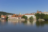 Fototapeta Miasto - Spring Prague gothic Castle with the Lesser Town above River Vltava in the sunny Day, Czech Republic