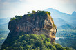 © Travel Wild - Spectacular view of the Lion rock surrounded by green rich vegetation. Picture taken from Pidurangala Rock in Sigiriya, Sri Lanka.