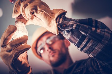 Wall Mural - Electrician Fixing the Light