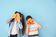© Pixel-Shot - Funny little children with citrus fruit on color background