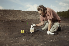 Uncovering Of Old Human Grave And Skull On Summer Terrain Excavations On Field Location