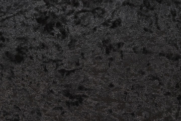 highly detailed texture of black velour cloth.