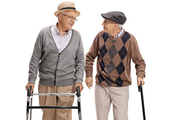 Sticker - Elderly man with walker and another man with cane walking