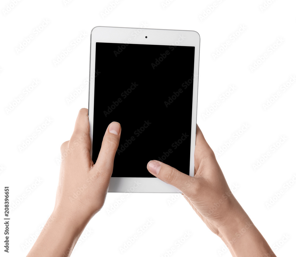 Young woman holding tablet computer on white background