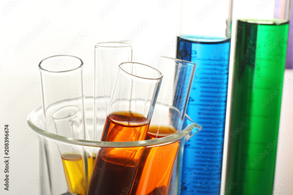 Test tubes with colorful liquids, closeup