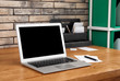 © Pixel-Shot - Stylish workplace with laptop on table