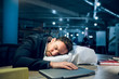 © Svyatoslav Lypynskyy - Tired business man sleeping at table with laptop. Handsome young guy sleeping on white pillow on table in his office with his hand on closed computer.
