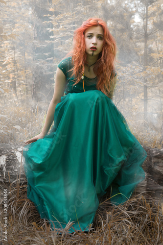 red hair and green dress
