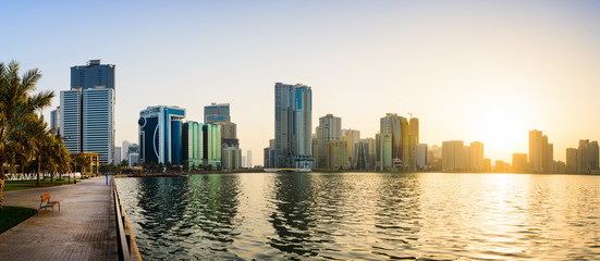 Panoramic view of Sharjah waterfront in UAE at sunset