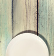 Top view, white, empty plate, wooden background, free space for text, Cuisine, menu, food concept