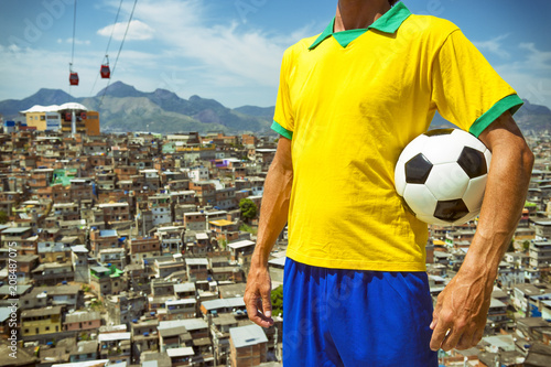 Juliste Brazilian football player standing in vintage style shirt holding soccer ball in