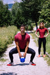 © Osigurach - Young fitness couple outdoor exercise