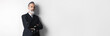© SFIO CRACHO - Portrait of bearded attractive gentleman wearing trendy suit over empty white background. Copy Paste text space. Wide.