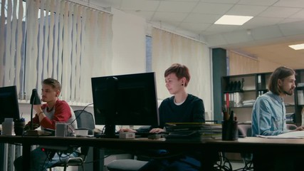 Students are Working on their Projects Together at Computers in the Office IT Room