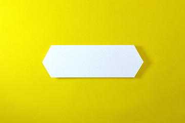 double arrow banner on yellow background