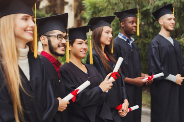 Poster - Group of multiethnic students on graduation day