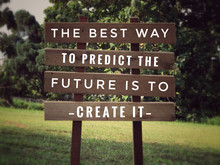 Motivational and inspirational quote - The best way to predict the future is to create it. With vintage styled background.