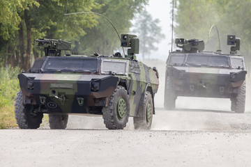 Wall Mural - German light armoured  reconnaissance vehicle drives on a road