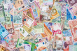 © RomanR - Mixed banknotes collection used for background, close up