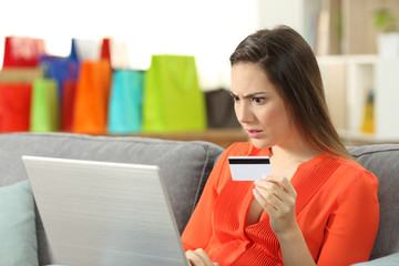 Poster - Shocked shopper buying online with credit card