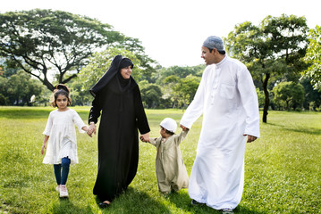 Wall Mural - Muslim family having a good time outdoors