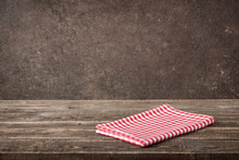 Red-white Checkered Napkin On Wooden Table
