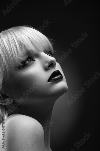 Back And White Photo Of Model With Blonde Hair Bright Blue